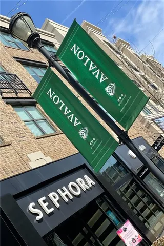 a view of a car park in front of building