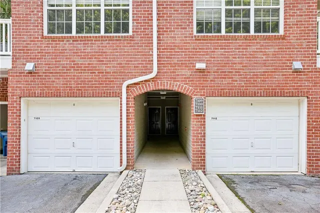 a view of a bathroom from a hallway