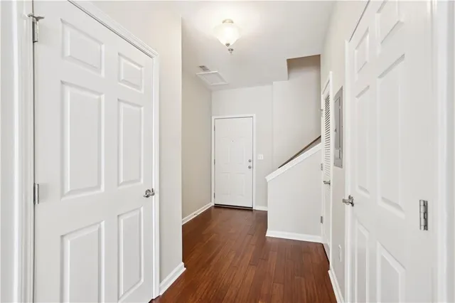 a bathroom with a sink a mirror and a window
