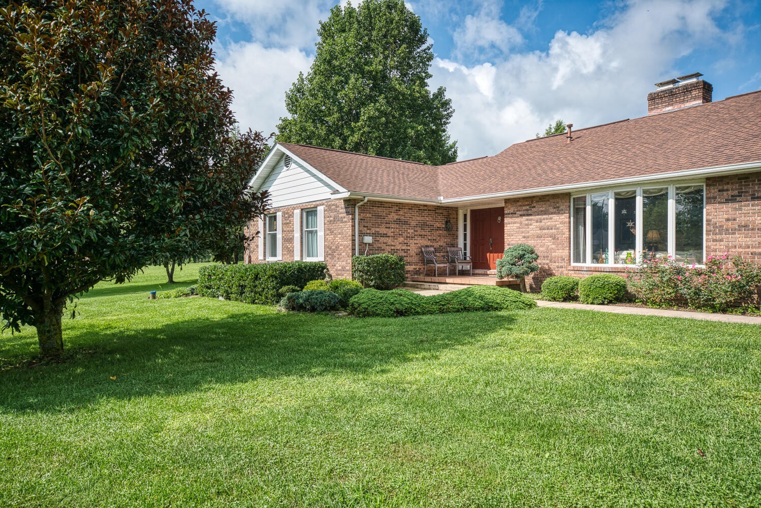 341 Roma Drive Crossville, TN 38555 - Photo 2 of 33 a front view of a house with a yard