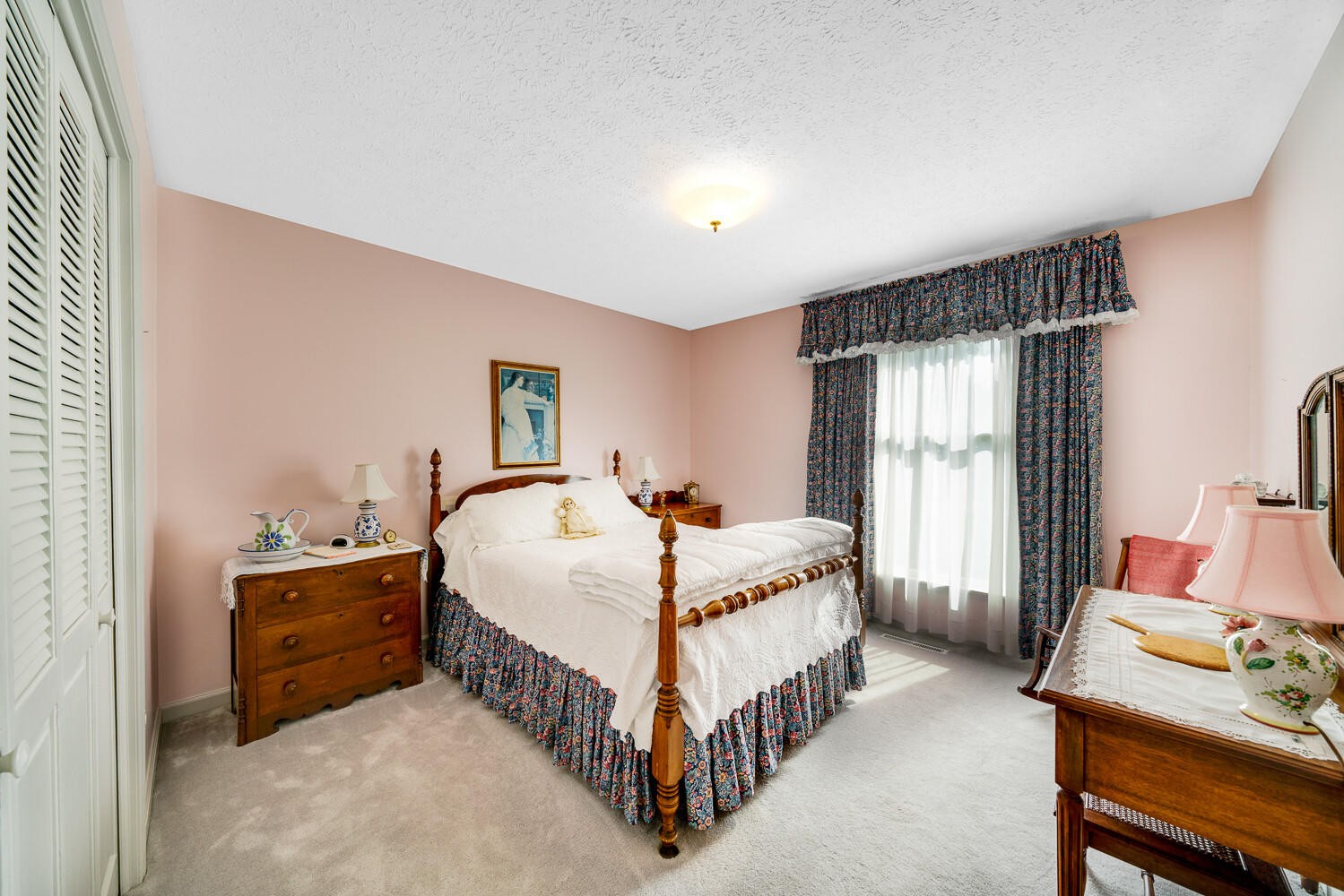 341 Roma Drive Crossville, TN 38555 - Photo 24 of 33 a bed room with a bed and a chair