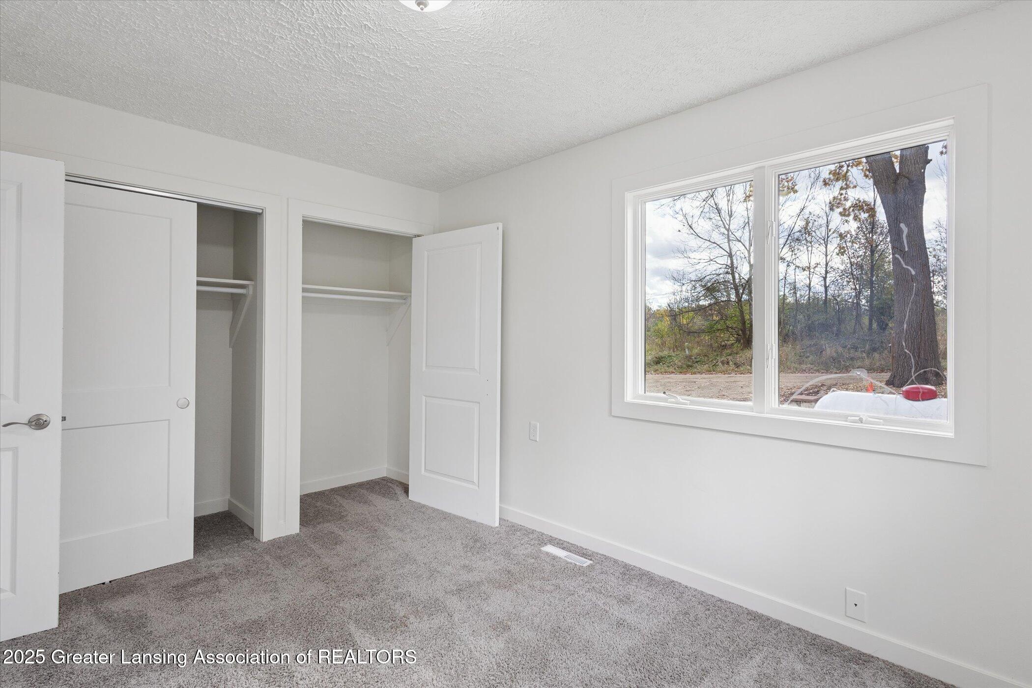 9595 East State Road Haslett, MI 48840 - Photo 16 of 47 15-9595-State-Rd-WindowStill-Photography