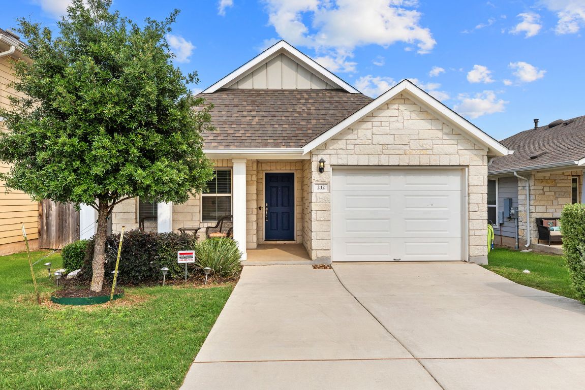 a front view of house with yard