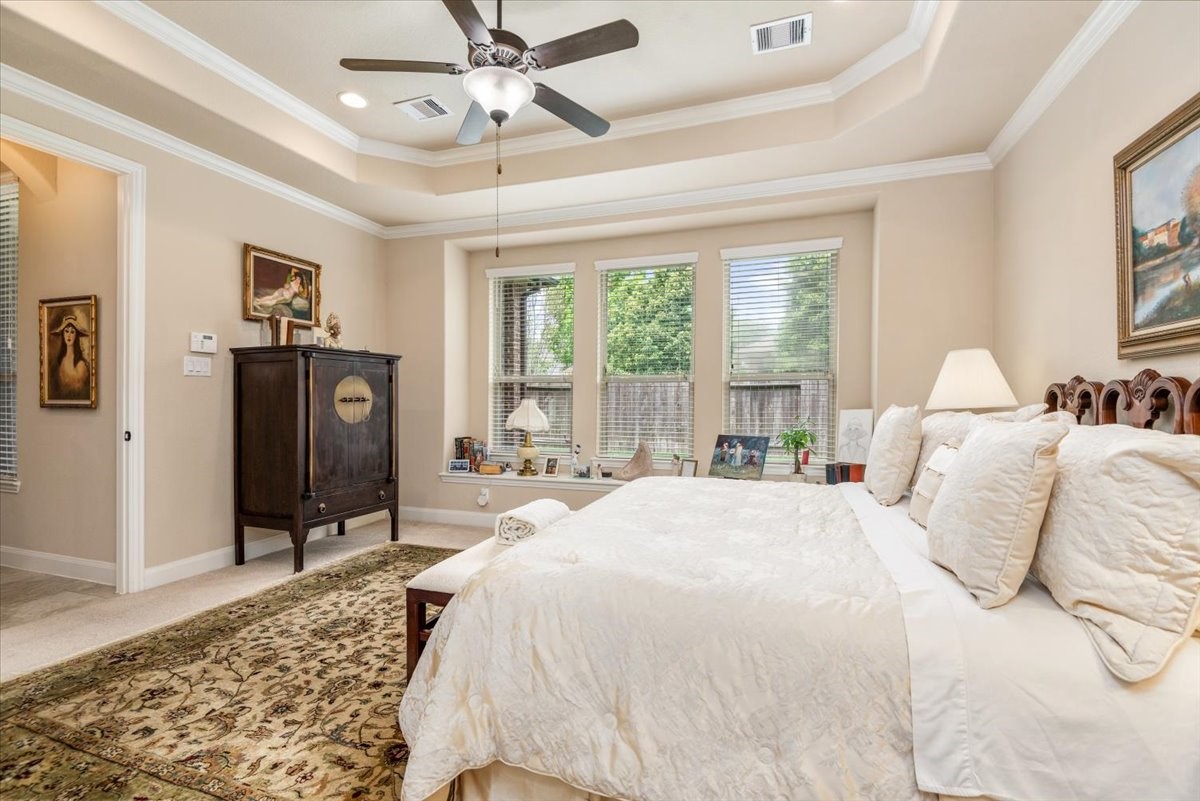 3771 Pinebrook Hollow Lane Spring, TX 77386 - Photo 17 of 50 a bedroom with a bed and wooden floor