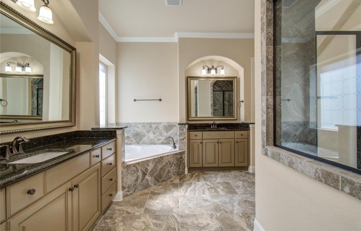 3771 Pinebrook Hollow Lane Spring, TX 77386 - Photo 20 of 50 a bathroom with a granite countertop sink a mirror and a