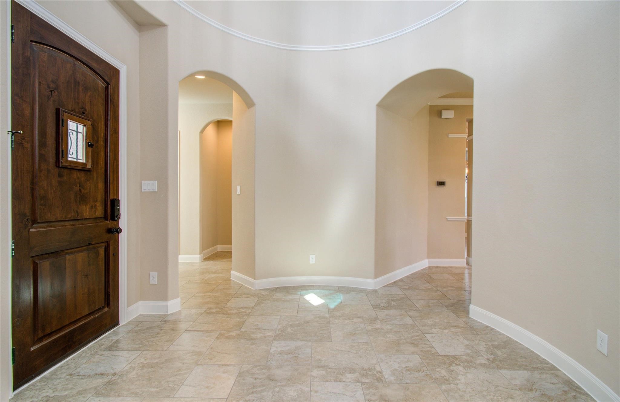 3771 Pinebrook Hollow Lane Spring, TX 77386 - Photo 25 of 50 a view of a livingroom with wooden floor and a refrigerator