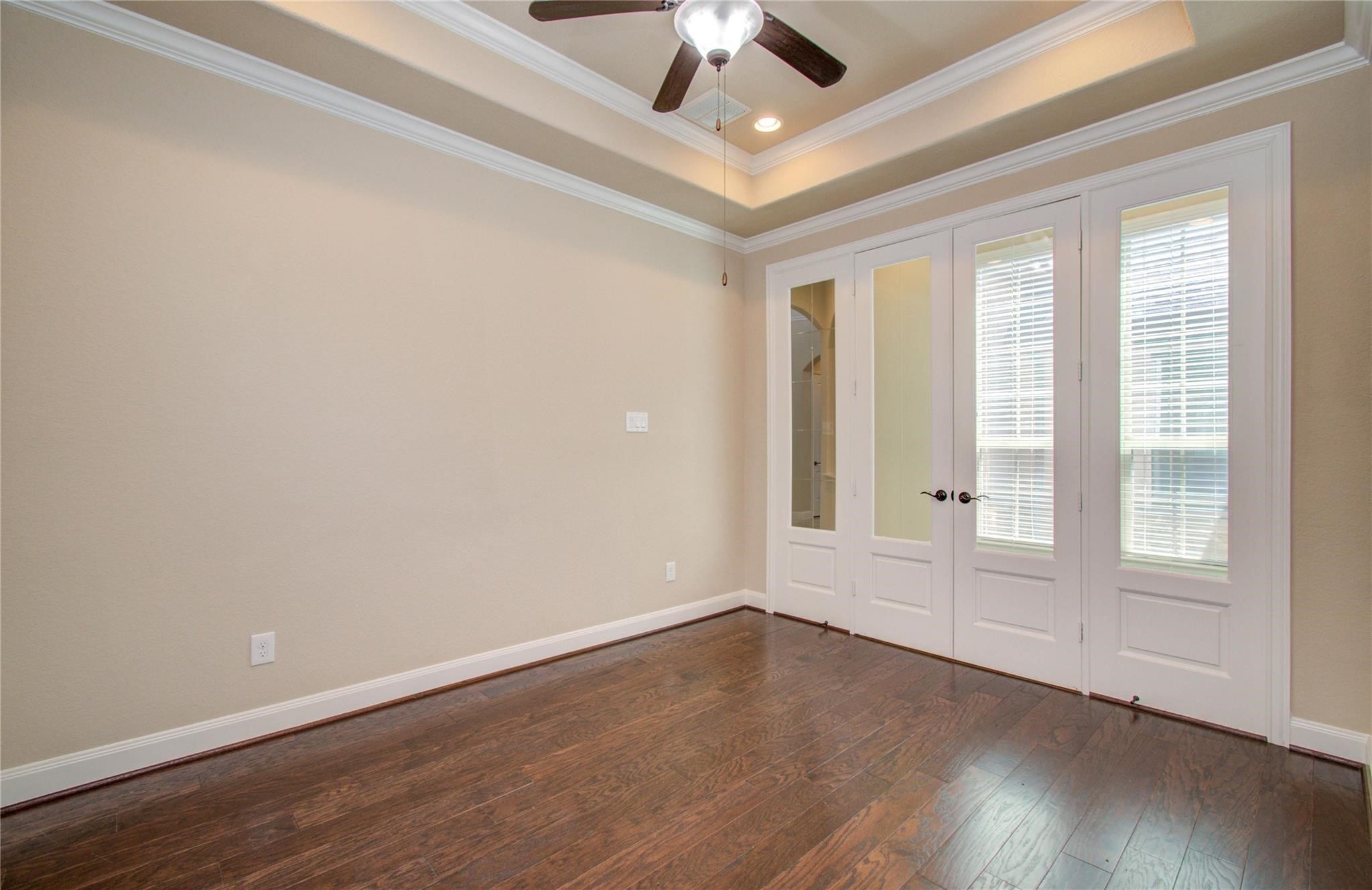 3771 Pinebrook Hollow Lane Spring, TX 77386 - Photo 29 of 50 Study with hardwood floors and etched glass French doors