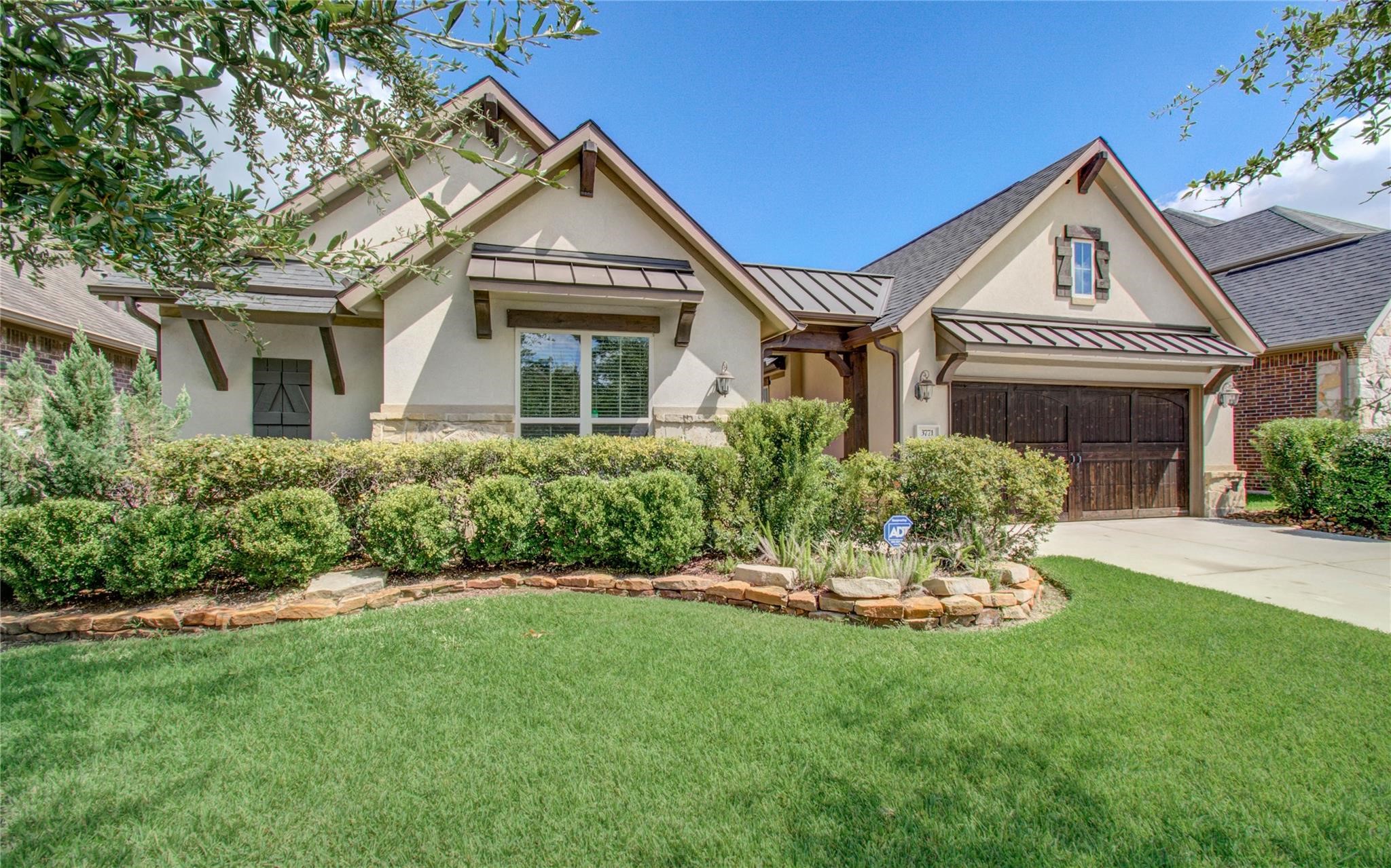 3771 Pinebrook Hollow Lane Spring, TX 77386 - Photo 3 of 50 A lush, professionally landscaped front yard creates a welcoming first impression.