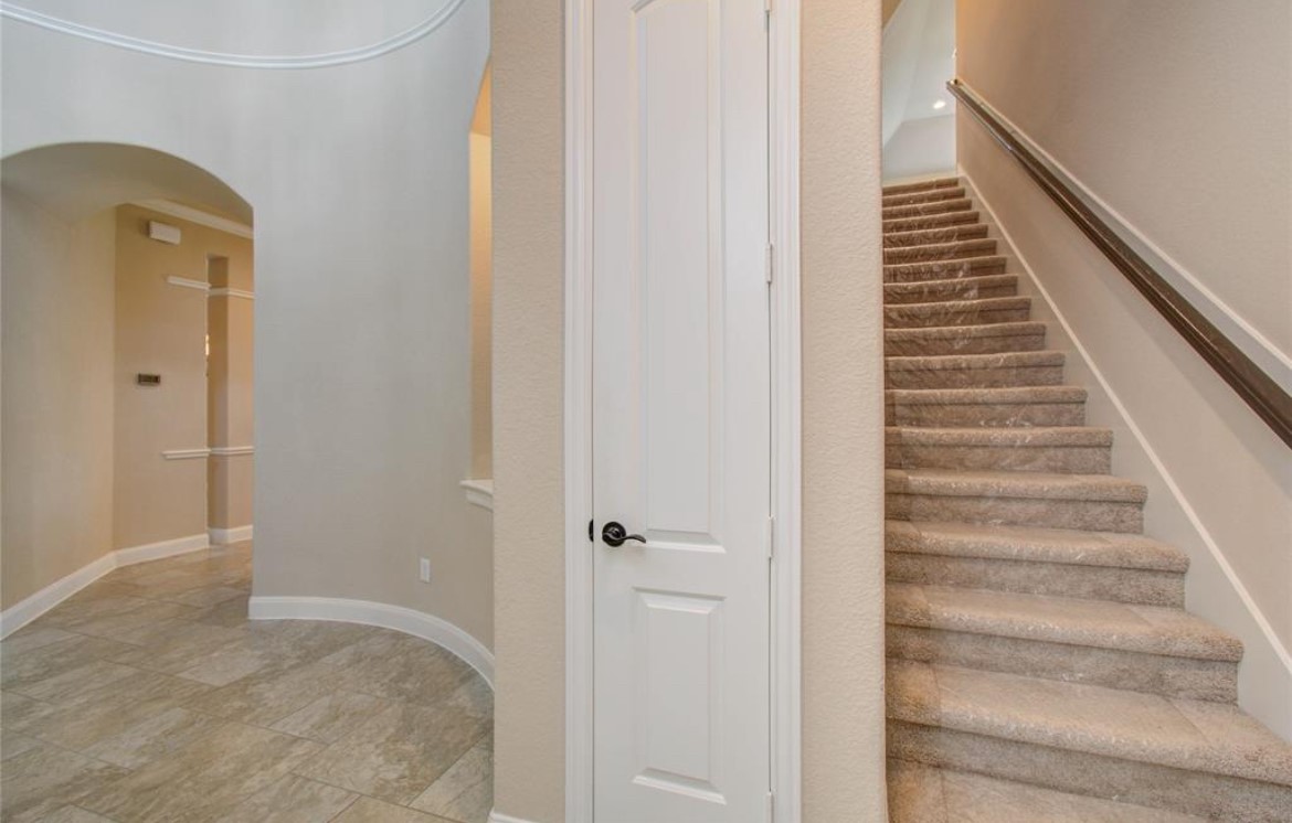 3771 Pinebrook Hollow Lane Spring, TX 77386 - Photo 34 of 50 a view of an entryway with staircase