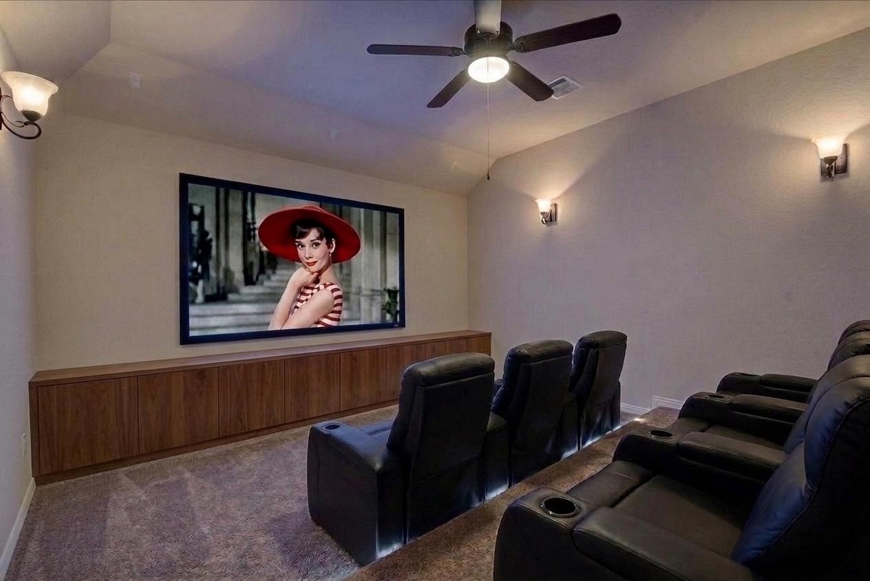 3771 Pinebrook Hollow Lane Spring, TX 77386 - Photo 37 of 50 a projector room with furniture