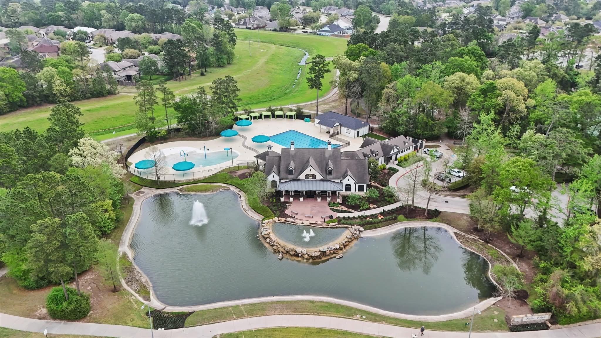 3771 Pinebrook Hollow Lane Spring, TX 77386 - Photo 43 of 50 The Lake Club is a members-only amenity featuring a fitness center, resort-style pool, splashpad, shaded nature playground, dog park, nature trails, and newly refinished club house and community area.