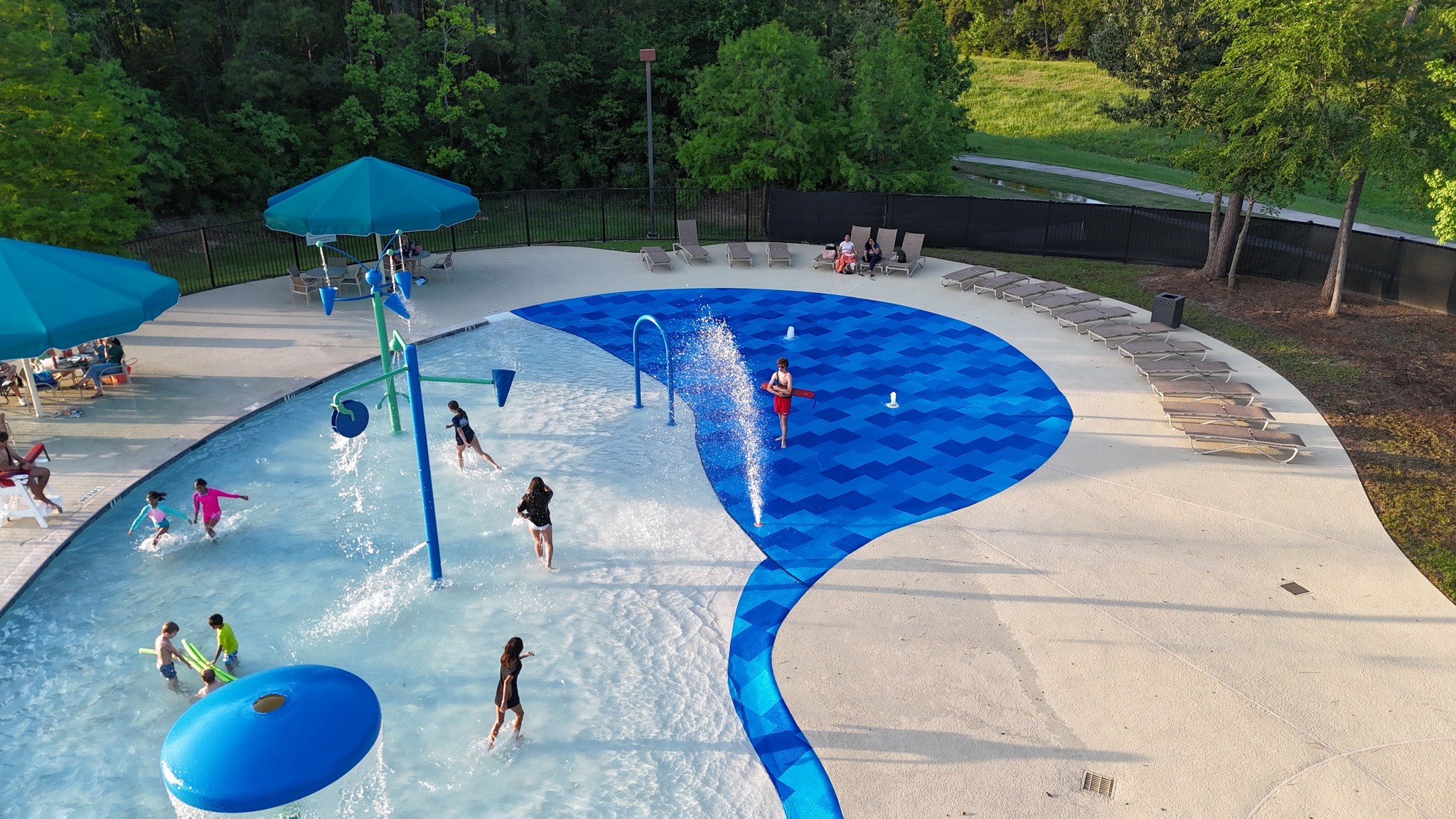 3771 Pinebrook Hollow Lane Spring, TX 77386 - Photo 45 of 50 Play all summer long at the newly updated and expanded splash pad at The Lake Club. The splash pad is exclusive to Falls at Imperial Oaks residents. Get to know your neighbors while relaxing as your kids make new friends with neighbors. The community center provides life-guards for an extra pair of eyes and safety.