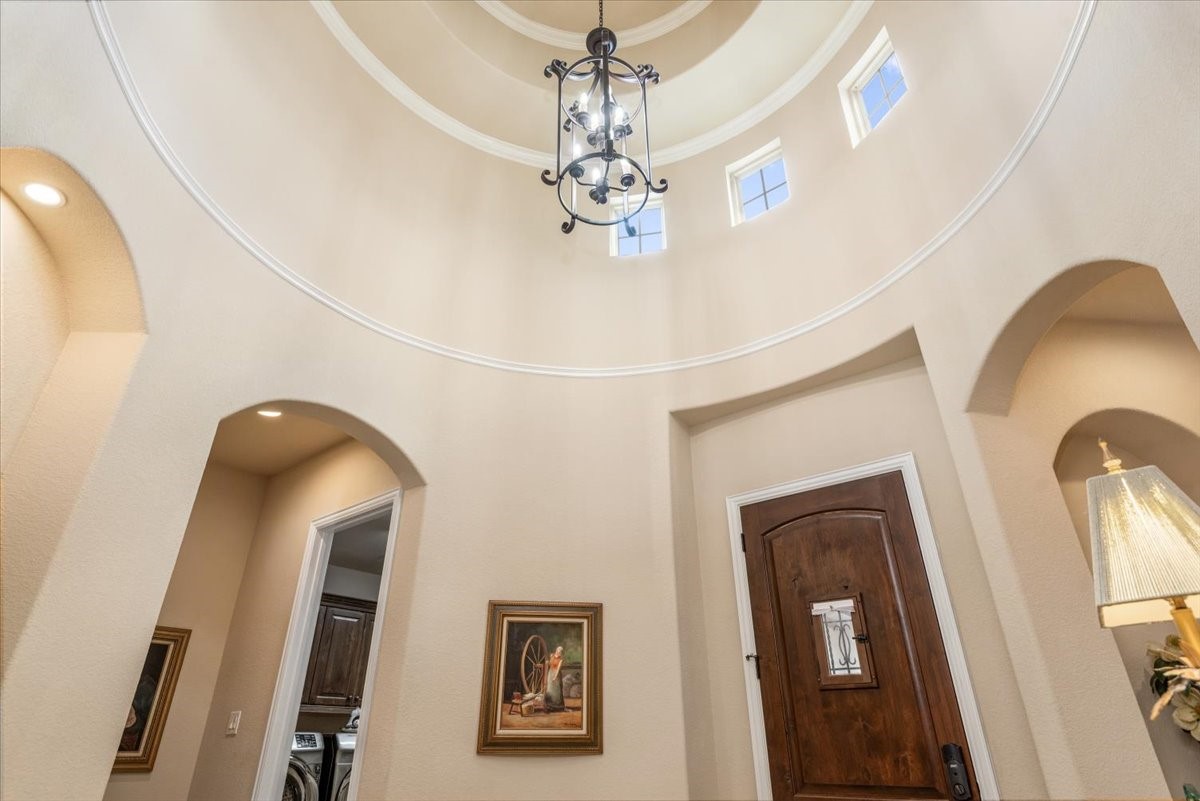 3771 Pinebrook Hollow Lane Spring, TX 77386 - Photo 9 of 50 a view of a livingroom with chandelier