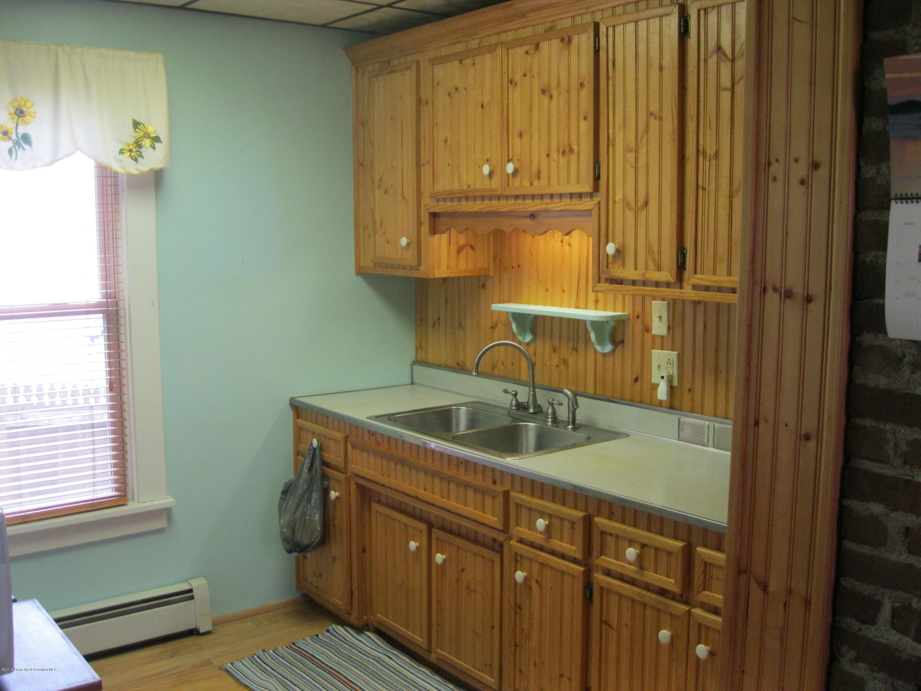 87 West Mt Airy Road Shavertown, PA 18708 - Photo 12 of 14 a kitchen with a sink and cabinets