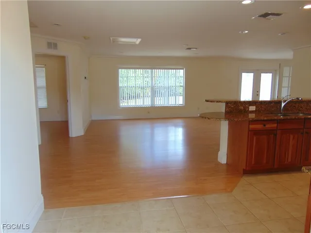 a view of a kitchen with sitting area