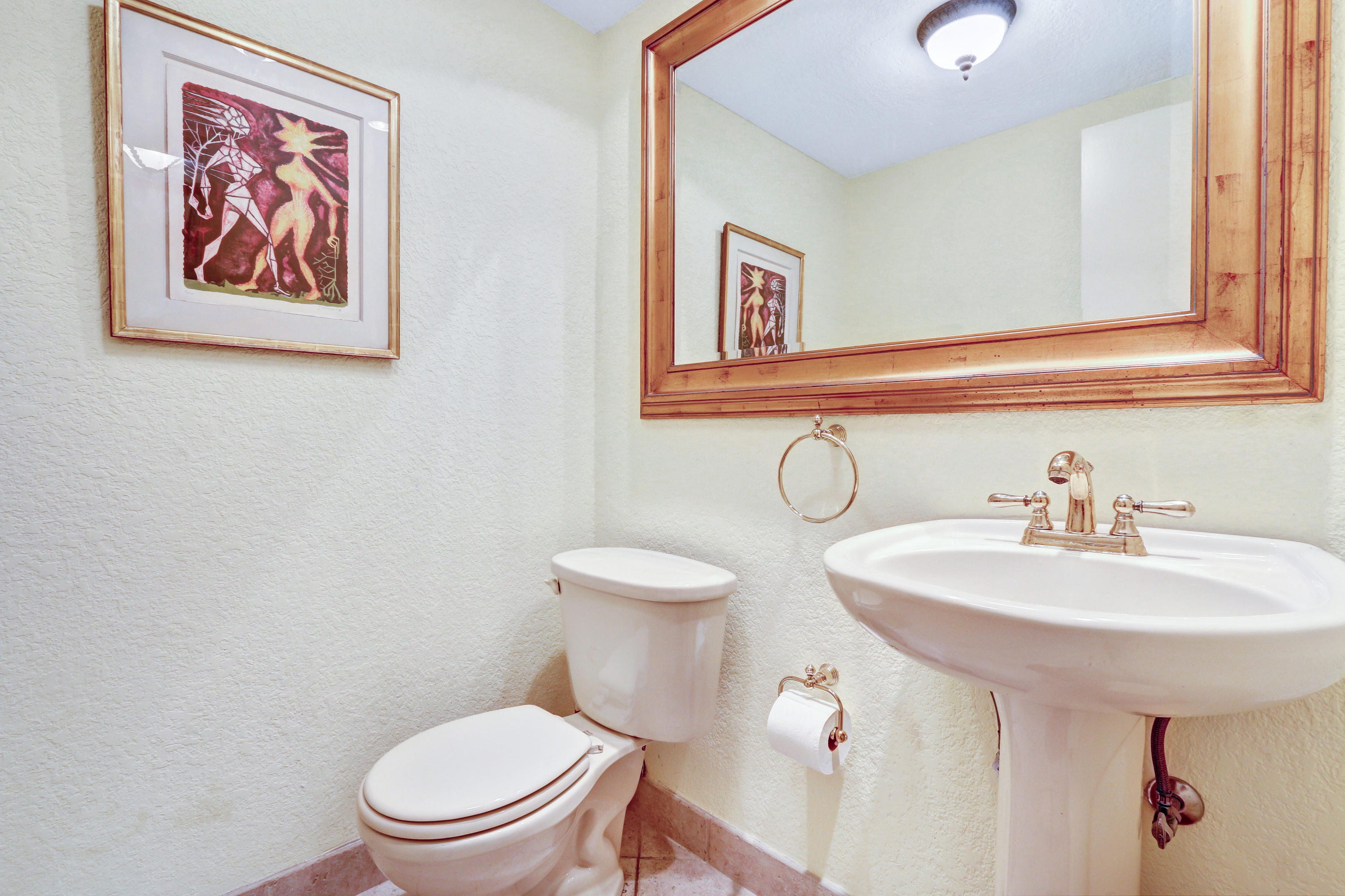 20828 Del Luna Drive Boca Raton, FL 33433 - Photo 11 of 20 a bathroom with a toilet sink and mirror