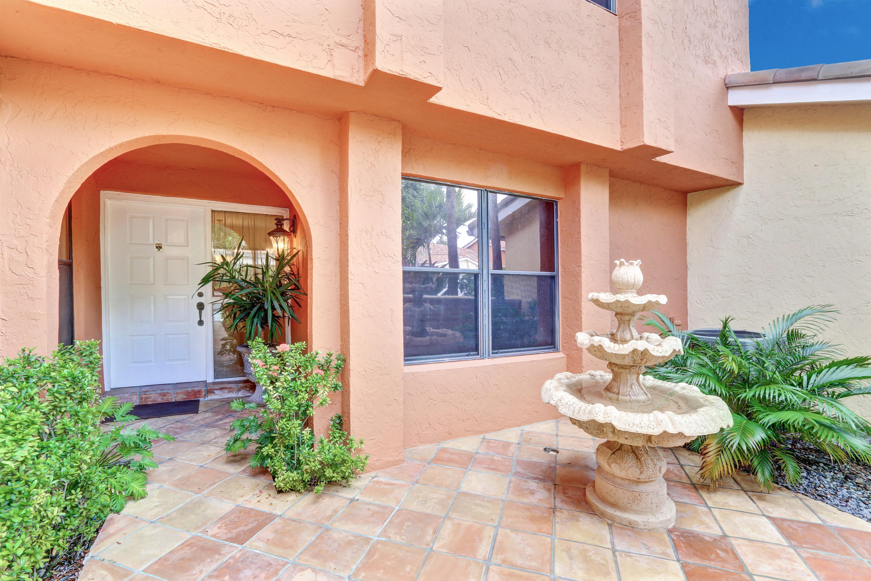 20828 Del Luna Drive Boca Raton, FL 33433 - Photo 3 of 20 a view of a porch with potted plants