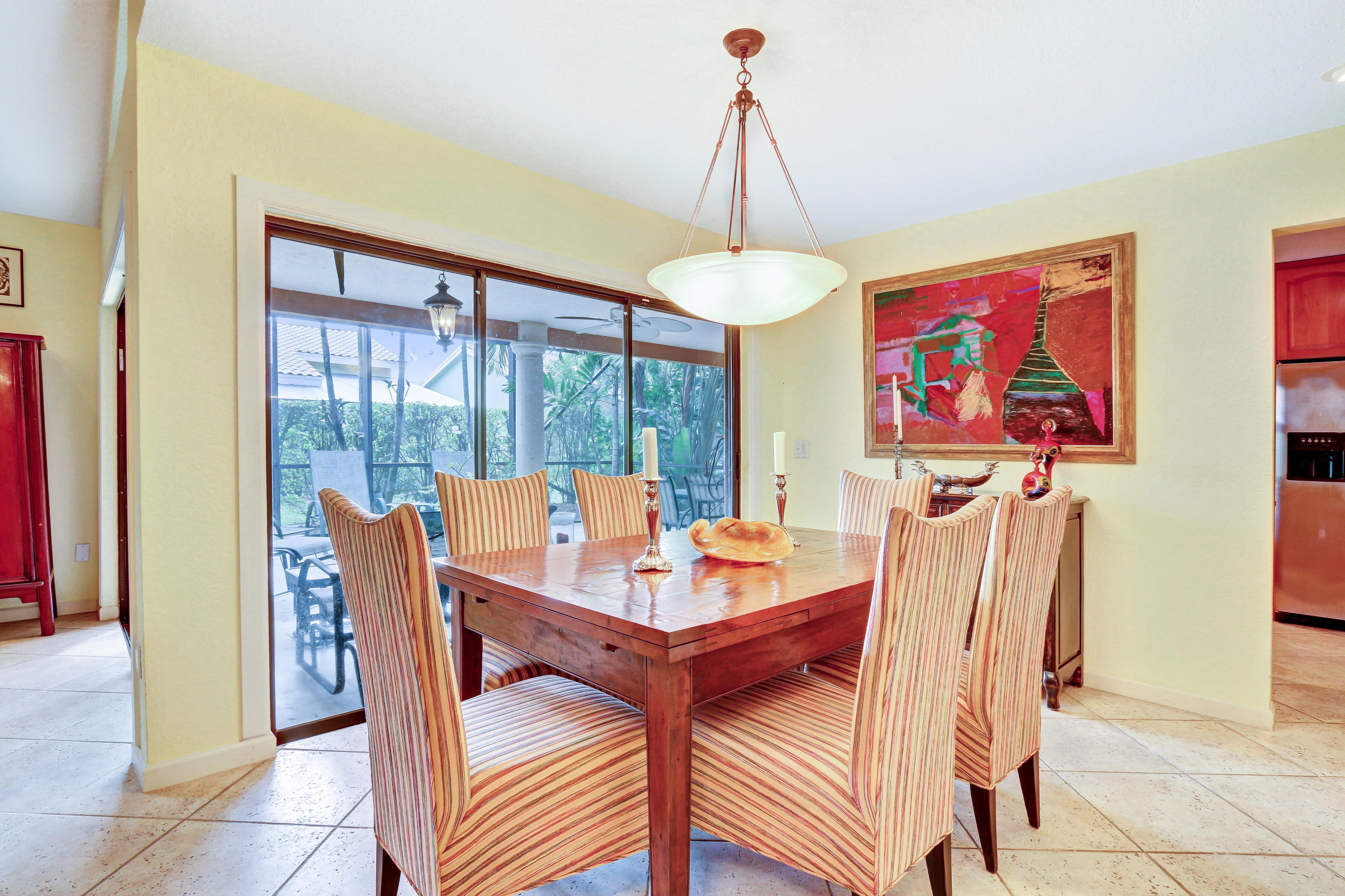 20828 Del Luna Drive Boca Raton, FL 33433 - Photo 6 of 20 a view of a dining room with furniture window and wooden floor