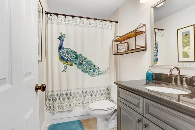 a view of kitchen with furniture and wooden floor