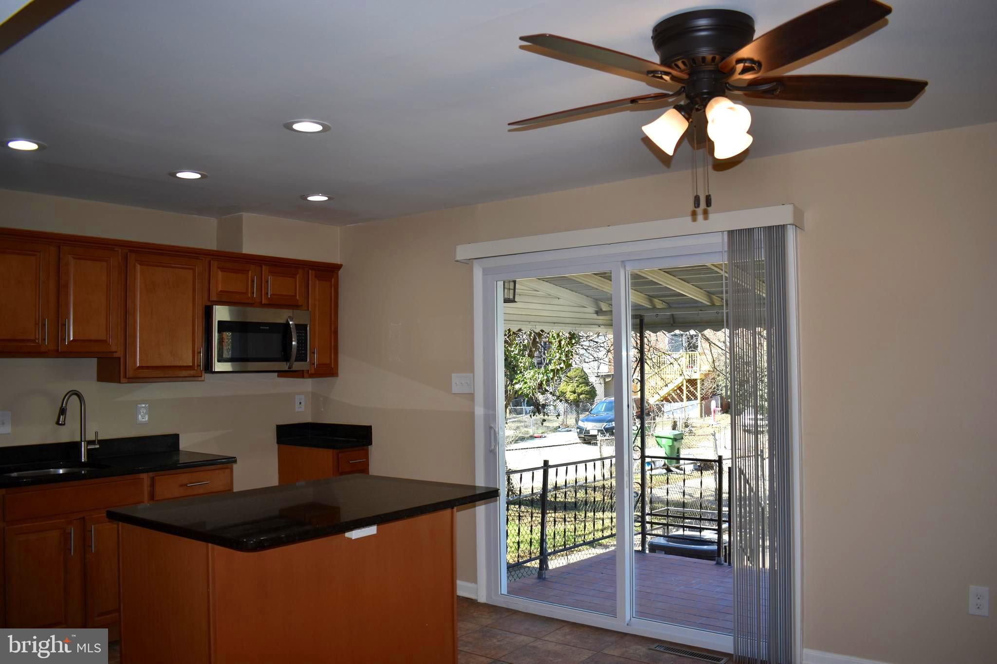 622 Markham Road Baltimore, MD 21229 - Photo 6 of 34 Sliding Glass Doors To Covered Patio