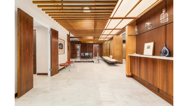 a picture of a bathroom with a shower and a sink