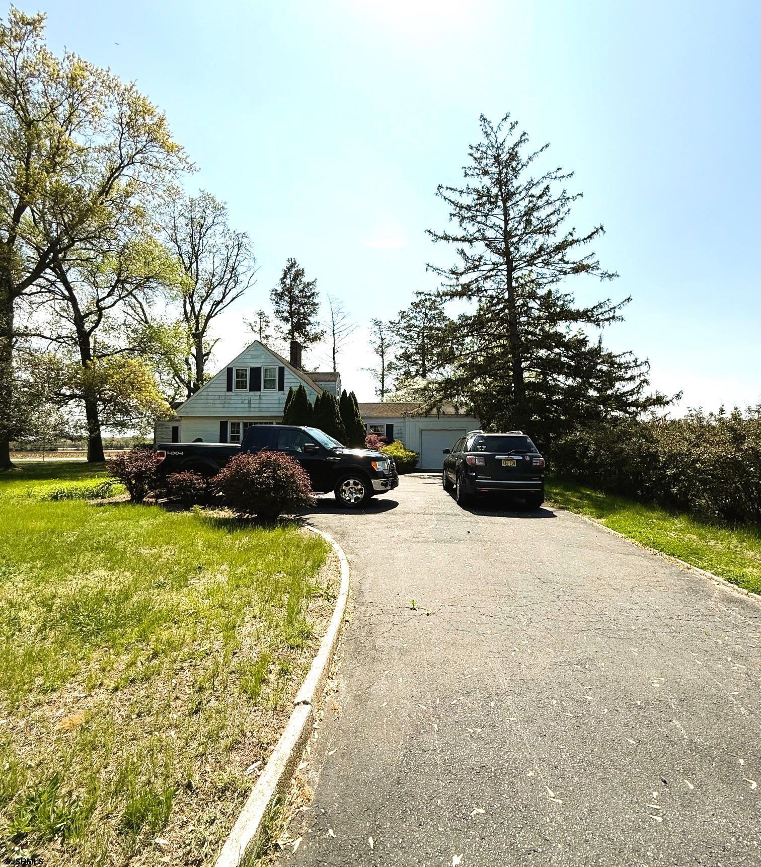 4 East Finley Road Bridgeton, NJ 08302 - Photo 2 of 33 a car parked on the side of the road