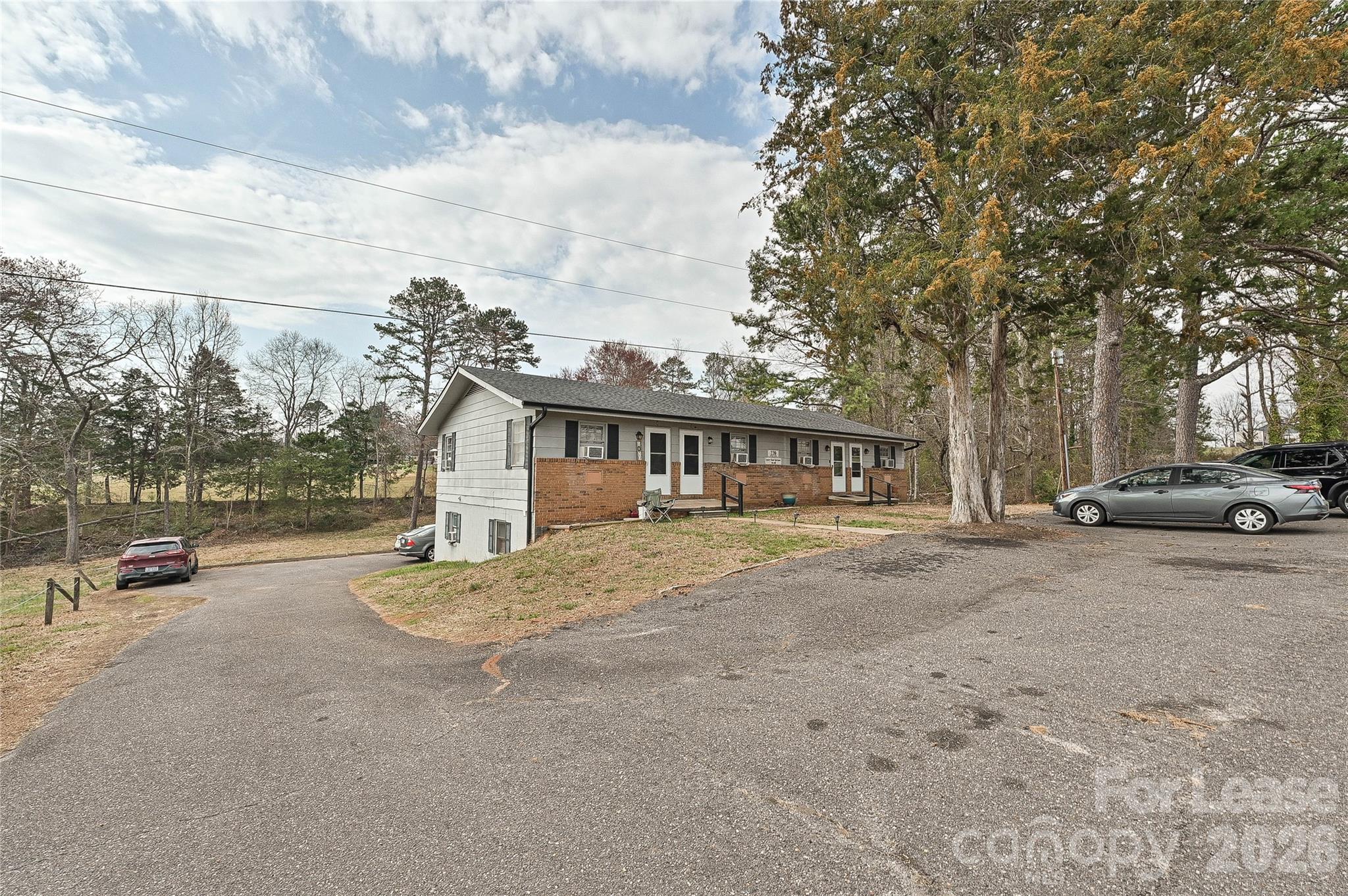 220 McDade Road, Unit 3 Forest City, NC 28043 - Photo 15 of 16 a view of a house with a outdoor space