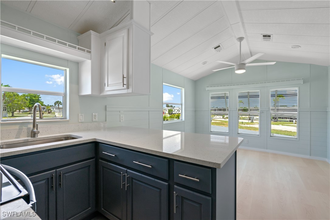 19681 Summerlin Road, Unit 234 Fort Myers, FL 33908 - Photo 21 of 41 a kitchen with a sink and a window