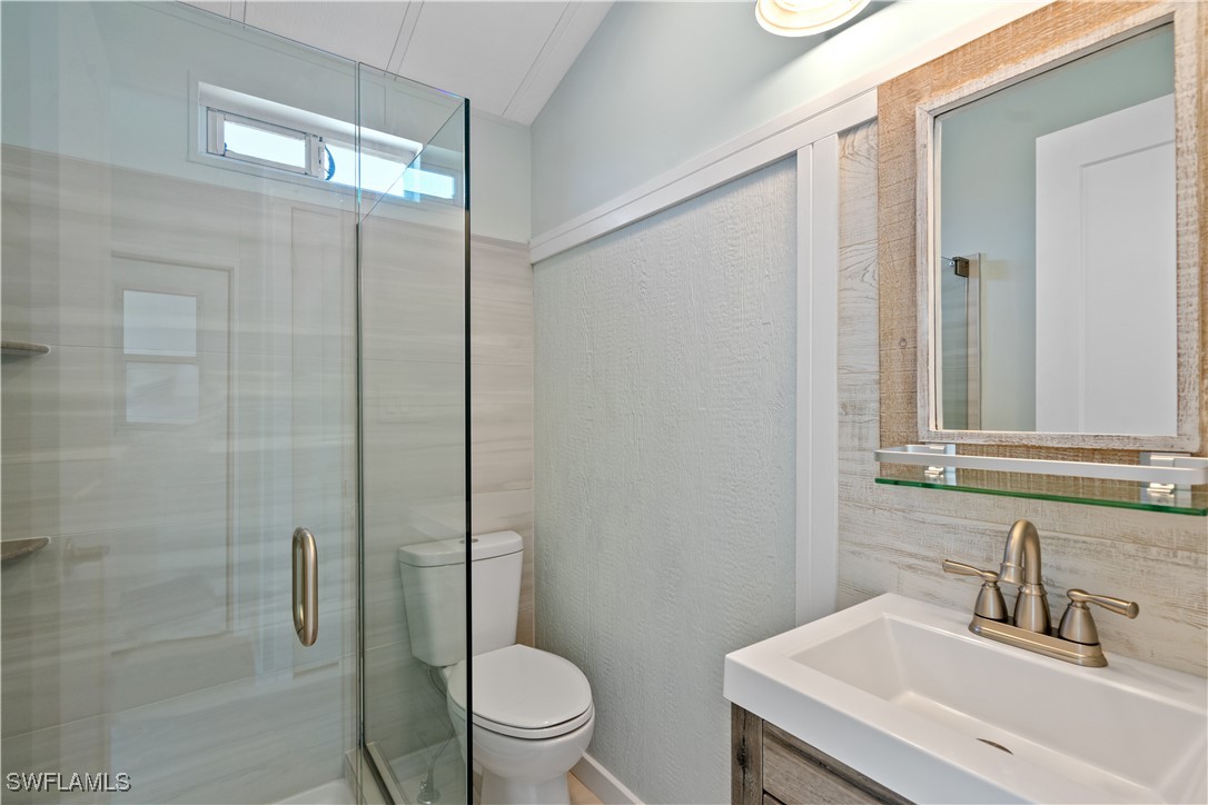 19681 Summerlin Road, Unit 234 Fort Myers, FL 33908 - Photo 22 of 41 a bathroom with a sink a toilet and shower