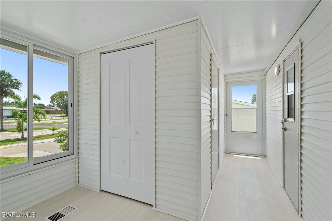 19681 Summerlin Road, Unit 234 Fort Myers, FL 33908 - Photo 28 of 41 a view of an empty room and a window