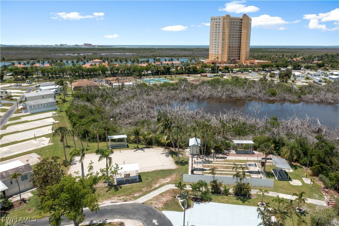 19681 Summerlin Road, Unit 234 Fort Myers, FL 33908 - Photo 34 of 41 a view of a lake with a city