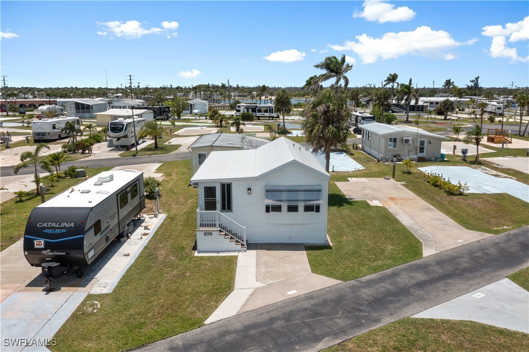 19681 Summerlin Road, Unit 234 Fort Myers, FL 33908 - Photo 38 of 41 a city view with houses