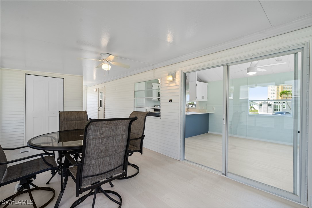 19681 Summerlin Road, Unit 234 Fort Myers, FL 33908 - Photo 6 of 41 a view of a room with furniture and wooden floor