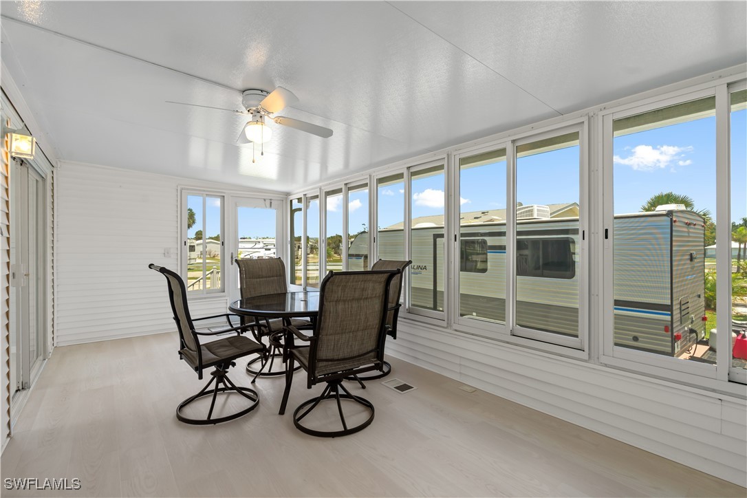 19681 Summerlin Road, Unit 234 Fort Myers, FL 33908 - Photo 8 of 41 a view of a dining room with furniture window and outside view