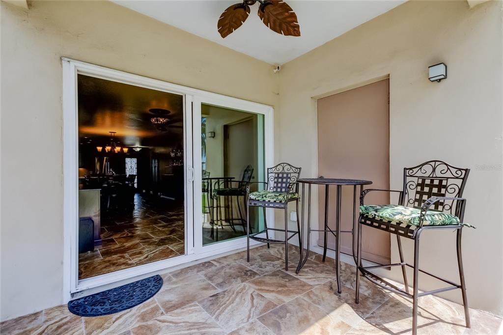 7003 Sunset Way, Unit 1 St. Pete Beach, FL 33706 - Photo 24 of 70 a view of a hallway with dining area