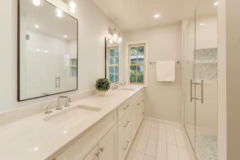 a view of an empty room with a fireplace