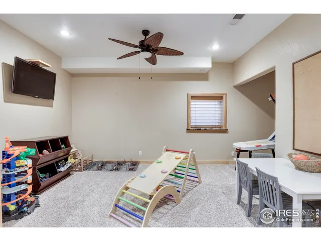 a very nice looking yard with a large tree