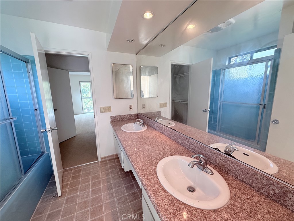 2575 Riverside Terrace Los Angeles, CA 90039 - Photo 14 of 29 a bathroom with a sink and a mirror