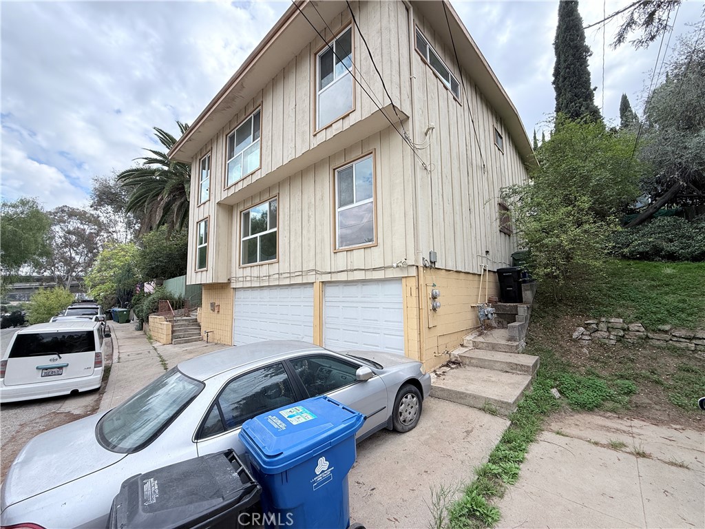 2575 Riverside Terrace Los Angeles, CA 90039 - Photo 29 of 29 a backyard of a house with yard fire pit and outdoor seating