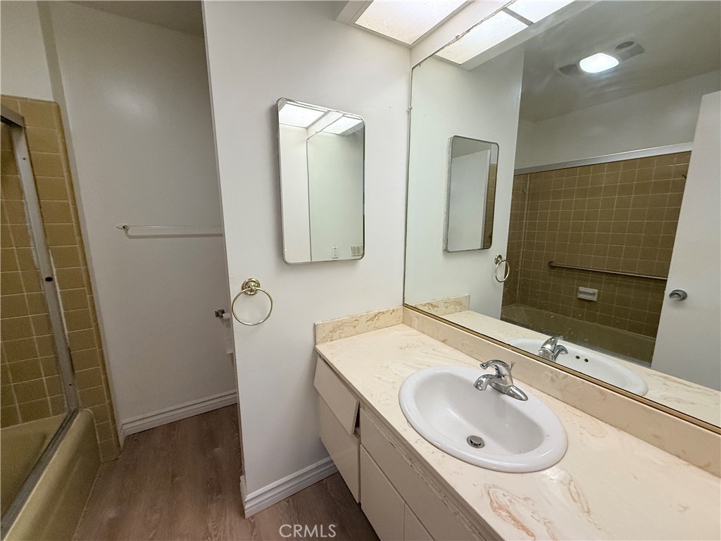 2575 Riverside Terrace Los Angeles, CA 90039 - Photo 10 of 29 a bathroom with double vanity sink and mirror
