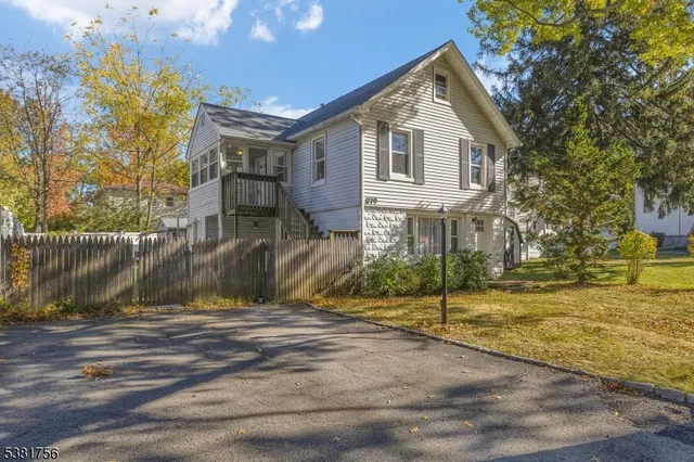 a kitchen with a sink cabinets and stainless steel appliances