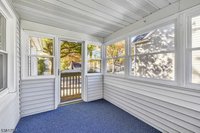 a kitchen with stainless steel appliances granite countertop a stove microwave and refrigerator