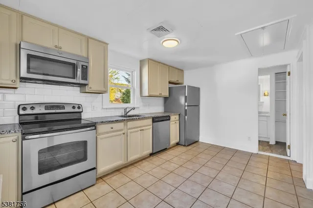 a bathroom with a sink and a bathtub
