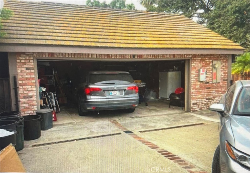 1920 Lorain Road San Marino, CA 91108 - Photo 13 of 32 a view of a patio with a chairs and a fireplace