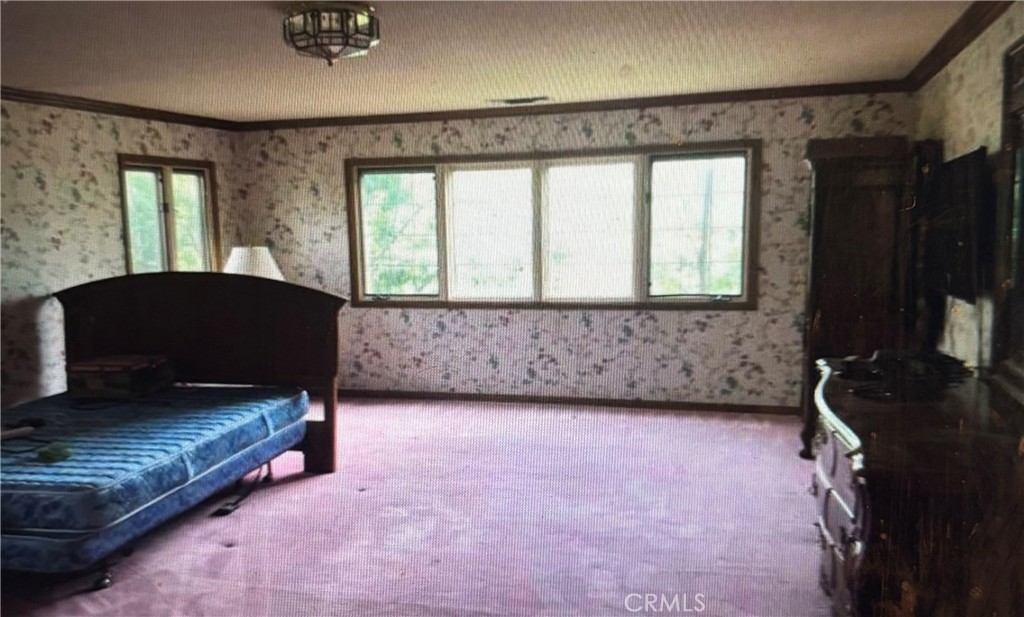 1920 Lorain Road San Marino, CA 91108 - Photo 15 of 32 a living room with a bed furniture and a window