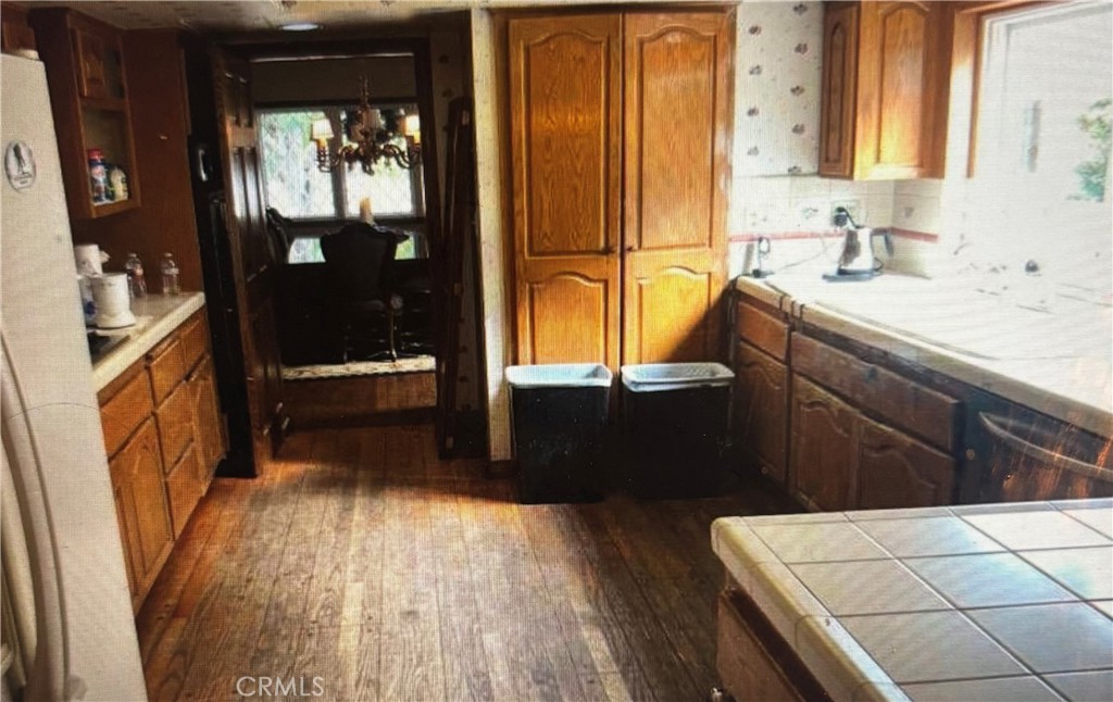 1920 Lorain Road San Marino, CA 91108 - Photo 19 of 32 a bathroom with a sink and a mirror