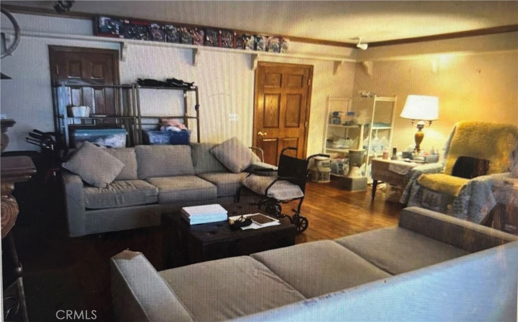 1920 Lorain Road San Marino, CA 91108 - Photo 21 of 32 a living room with furniture and a chandelier