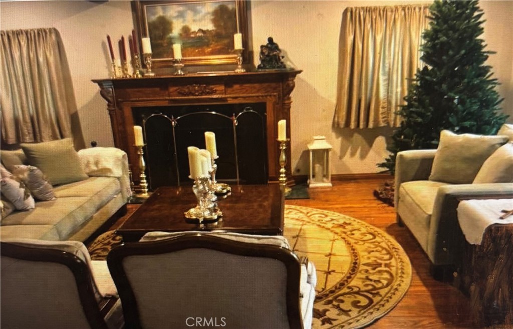 1920 Lorain Road San Marino, CA 91108 - Photo 23 of 32 a living room with furniture and a fireplace