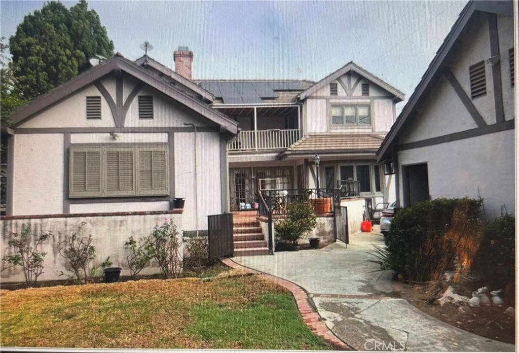 1920 Lorain Road San Marino, CA 91108 - Photo 25 of 32 a front view of a house with porch
