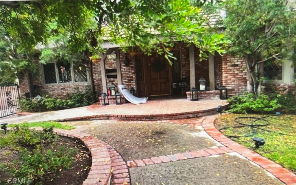 1920 Lorain Road San Marino, CA 91108 - Photo 4 of 32 front view of a house with a yard